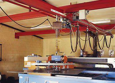 Overhead material handling with an overhead crane